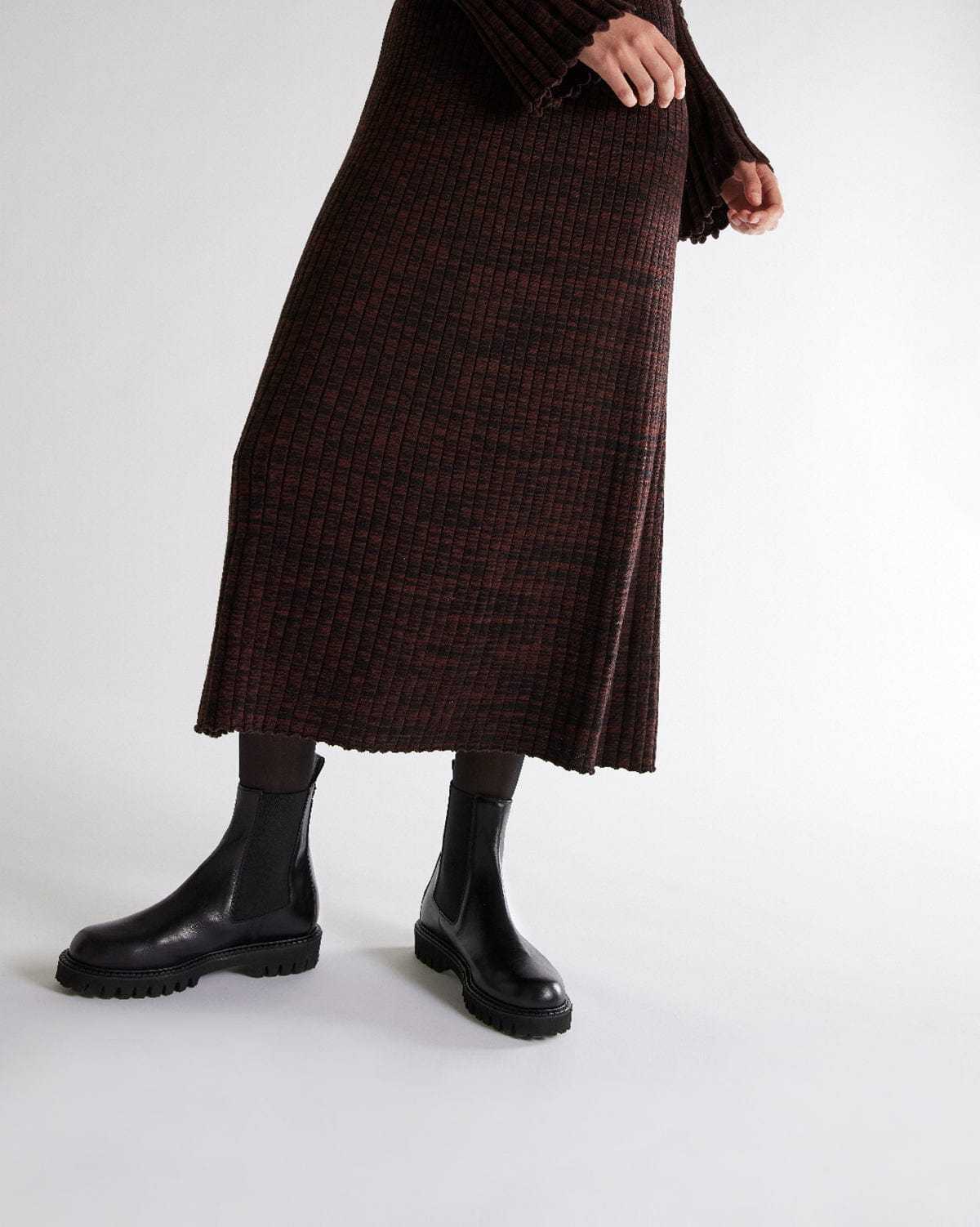 lug sole black leather boots