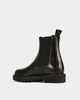 black leather lug sole boots
